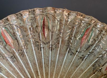 null Silk embroidery, circa 1800
Folded fan, the silk leaf embroidered with green...