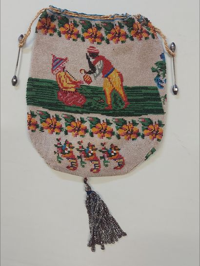 null Pearl knit purse, circa 1830, both sides decorated with turquerie in polychrome...