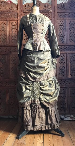 null Day dress, circa 1885, in striped taffeta bronze green and buff and shaped silk...