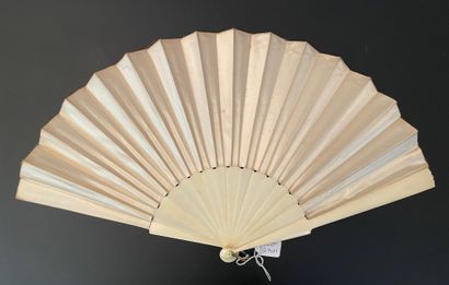 null Two fans, circa 1880 *One, the leaf in cream satin painted with roses.
Bone...