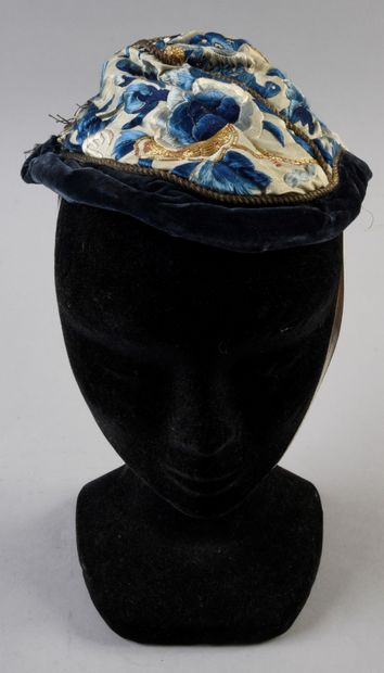 null 475. Small Chinese-style lady's hat, late 19th century, blue velvet cap on brassed...