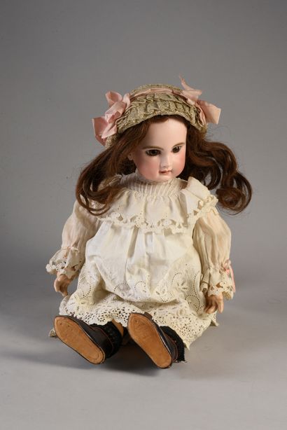 null BABY JUMEAU 9
French doll, with cast bisque head, closed mouth, marked DEPOSE...