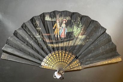 null Three fans, late 19th century *One, the black satin leaf painted with a couple...
