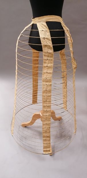 null 470. cage crinoline, circa 1870, crinoline with 25 metal hoops attached to the...