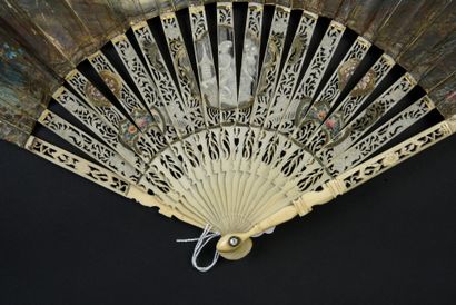 null Two fans, circa 1770-1780 *One, the leaf painted with a gallant scene. The reverse...