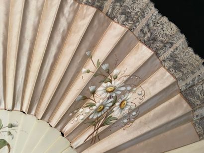 null Daisy and lily of the valley, circa 1890
Large fan, the leaf in cream satin...
