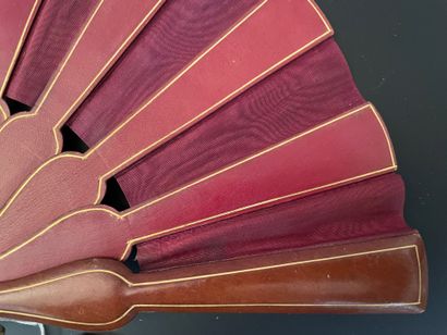 null Leather and silk, circa 1880
Folded fan, in the taste of the Rodeck fan house,...