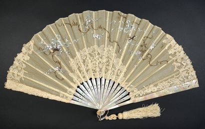 null Two fans, circa 1890 *One, the leaf in beige gauze and bobbin lace painted with...