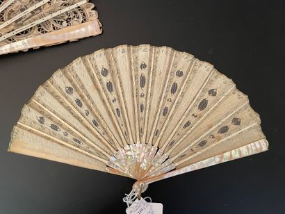 null Two fans, circa 1900 *One, the silk leaf painted with branches enhanced with...