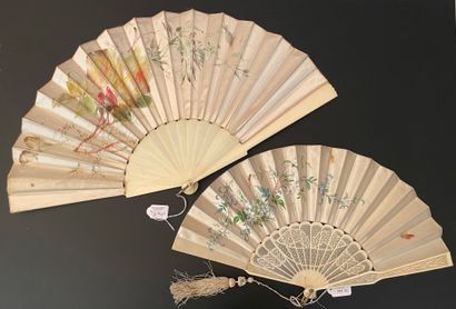 null Two fans, circa 1880 *One, the leaf in cream satin painted with roses.
Bone...