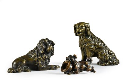 Lot of three dog figures in bronze: A spaniel...