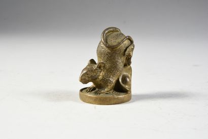 null Rat of fortune
In bronze on a Chinese coin and an ingot called yuanbao. Stamped...