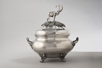 null Covered tureen resting on four feet with foliage scrolls and two handles and...