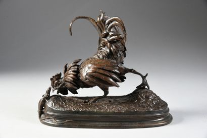 FERDINAND PAUTROT (1832 - 1874) Rooster surprised by a lizard.
Bronze with brown...