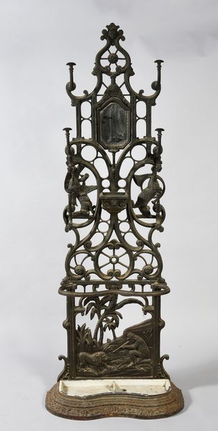 Cast iron coat rack with animal and scroll...