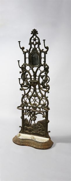 null Cast iron coat rack with animal and scroll decoration, with a mirror.
200 x...