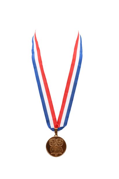 null Official gold medal of winner given to the players and the staff of the French...