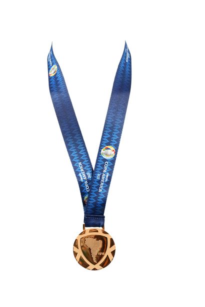null Gold medal of winner given to the players and staff of the National Team of...