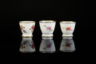 null Three porcelain egg cups (soft and hard) of Sèvres of the XVIIIth century Marks...