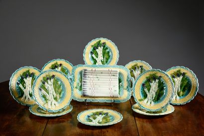 null Asparagus service in polychrome earthenware composed of 10 plates and a serving...