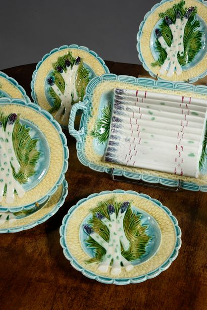 null Asparagus service in polychrome earthenware composed of 10 plates and a serving...