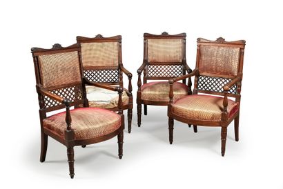null Suite of four mahogany and mahogany veneered armchairs, they stand on sheath...
