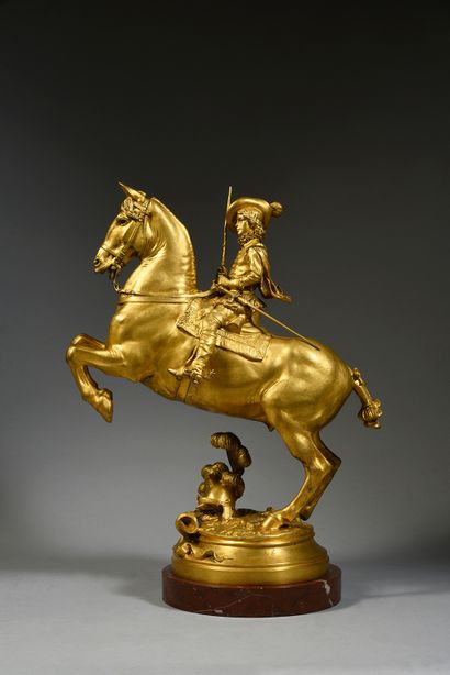 Emmanuel FREMIET ( 1824 - 1910) Louis XIII enfant à cheval.
Bronze à patine doré,...