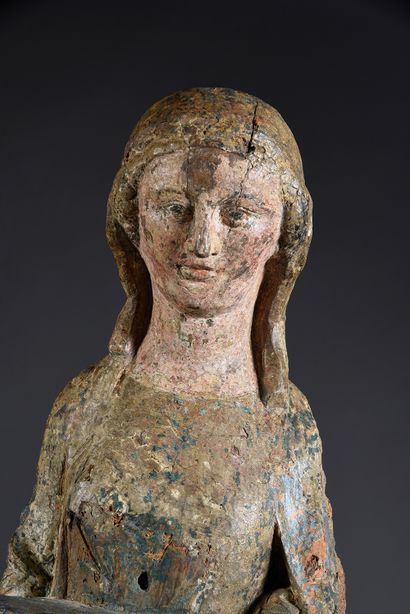 Xvè siècle Sainte femme en bois sculpté et polychromé, dos ébauché.
H. : 70 cm
(manques...