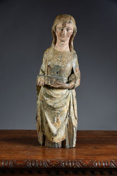 Xvè siècle Sainte femme en bois sculpté et polychromé, dos ébauché.
H. : 70 cm
(manques...