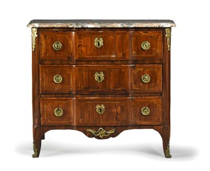 null Chest of drawers with a central recess opening to three drawers, decorated with...