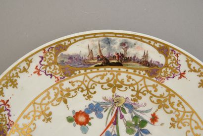 null Porcelain plate in the style of Meissen Marks in blue with two crossed swords
Decorated...