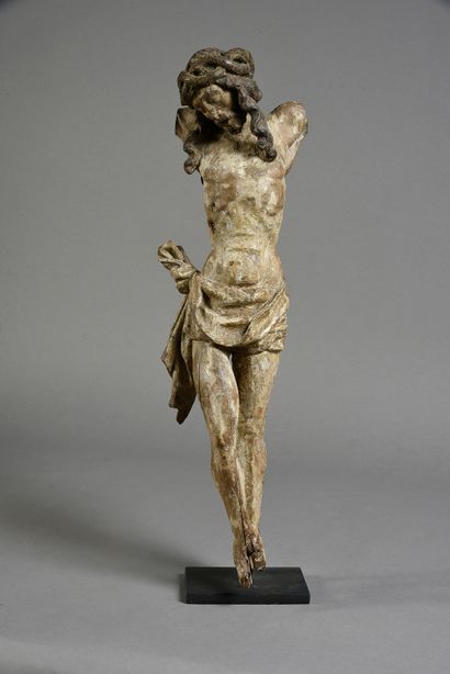 Louvain, fin du XVe siècle Christ in carved and polychromed oak. Head tilted on his...