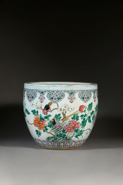 null Porcelain aquarium decorated with enamels of the pink family of flowering branches...