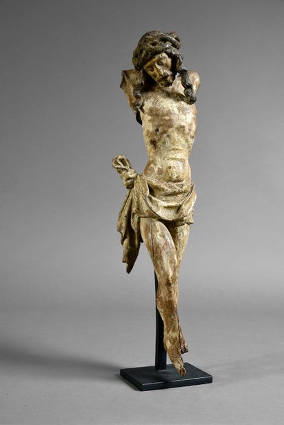Louvain, fin du XVe siècle Christ en chêne sculpté et polychromé. Tête inclinée sur...