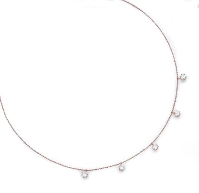 null Delicate necklace in pink gold 750e, decorated with five diamonds in pendant...