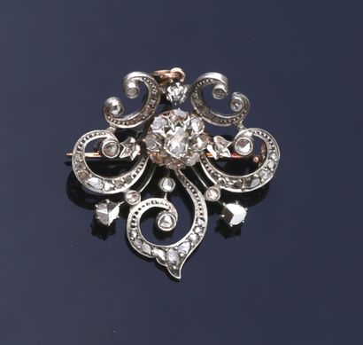 null Brooch / pendant in silver 925 and gold 750th, with a flower set with roses....