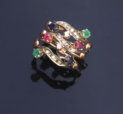 null Triple ring in gold 750e and silver 800e, set with sapphire, emeralds, rubies...