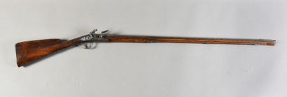 null Rifle, flintlock and flat-bodied, lightly engraved and signed, octagonal barrel...