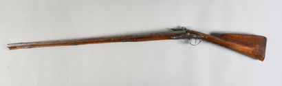 null Rifle, flintlock and flat-bodied, lightly engraved and signed, octagonal barrel...