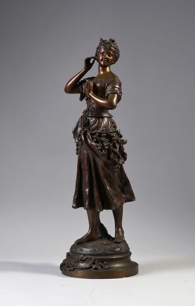 ANFRIE Charles (1833-1905) Retour des cerises.
Statuette en bronze à patine brune,...