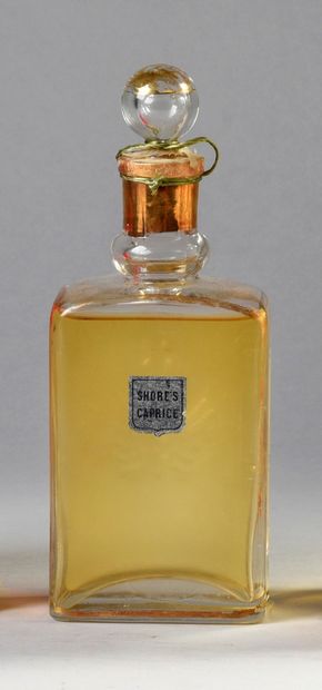 GUERLAIN "Shore's Caprice" - (1890's)
Rare colorless pressed glass bottle of rectangular...