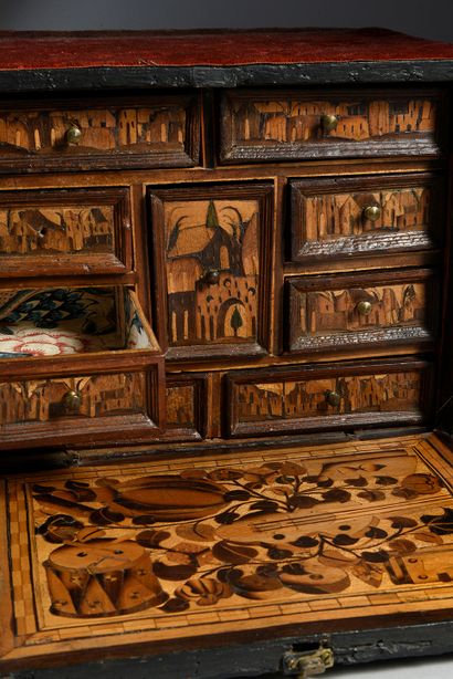 null Cabinet in fruitwood marquetry opening to a flap discovering eight drawers decorated...