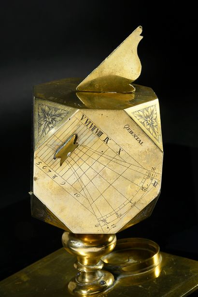 null Exceptional sundial of cubic shape with downturned angles in brass.
This polyhedron...