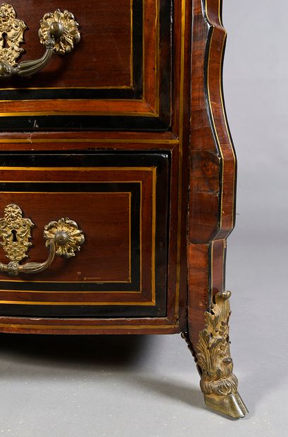 null Chest of drawers with a crossbow front, opening to five drawers on three rows,...