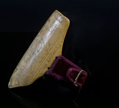 null Archer's cuff in ivory engraved with a Saint Michael carrying a shield; inscriptions...