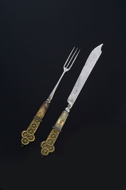 null Three-pronged fork and knife in steel and gilded metal, three-lobed end.
Netherlands,...