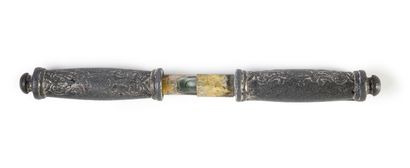 null A lead embossed level with traces of silver plating, in two parts, decorated...