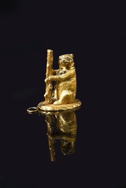 null Small box in gilded metal representing a bear chained to a tree trunk on a base,...