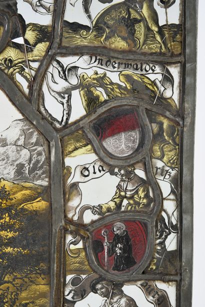 null Stained glass window in silver yellow, red, blue representing a messenger bringing...