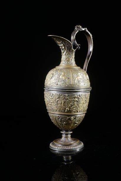 null Ewer in bronze with remains of silvering. Decoration of the theological virtues...